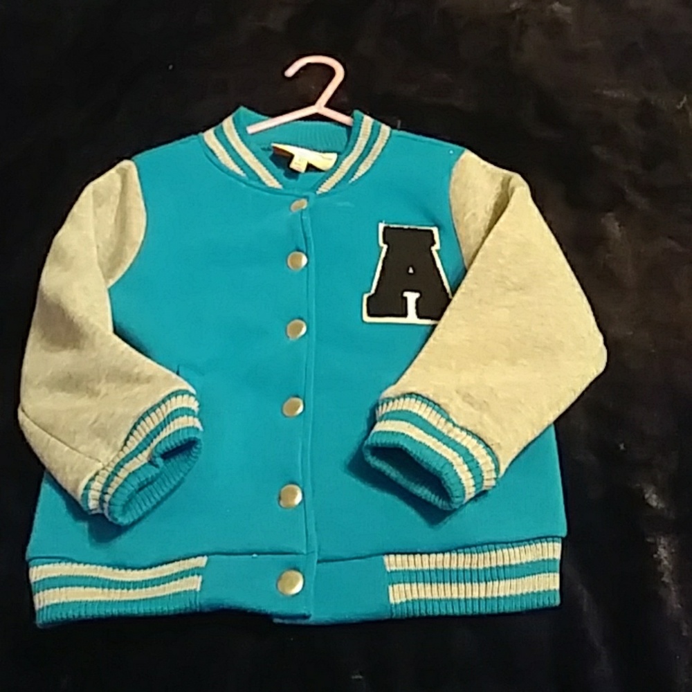 Girls or can be a boys 0Letter jackets